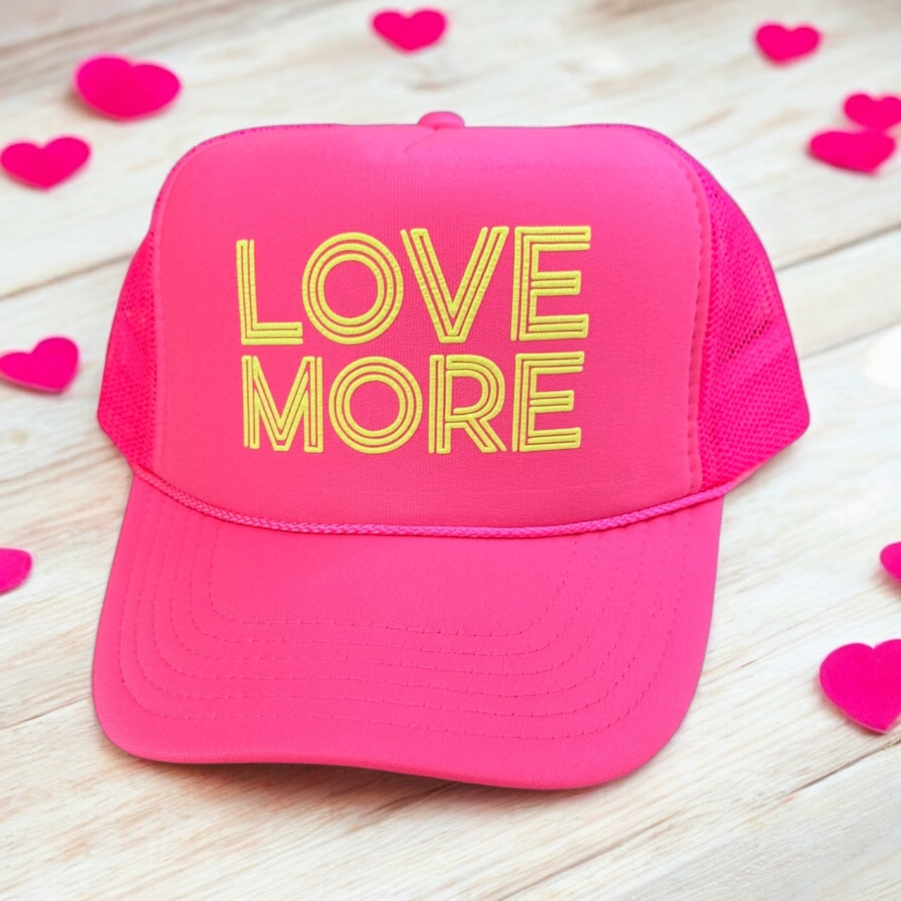 LOVE MORE - Neon Pink Trucker