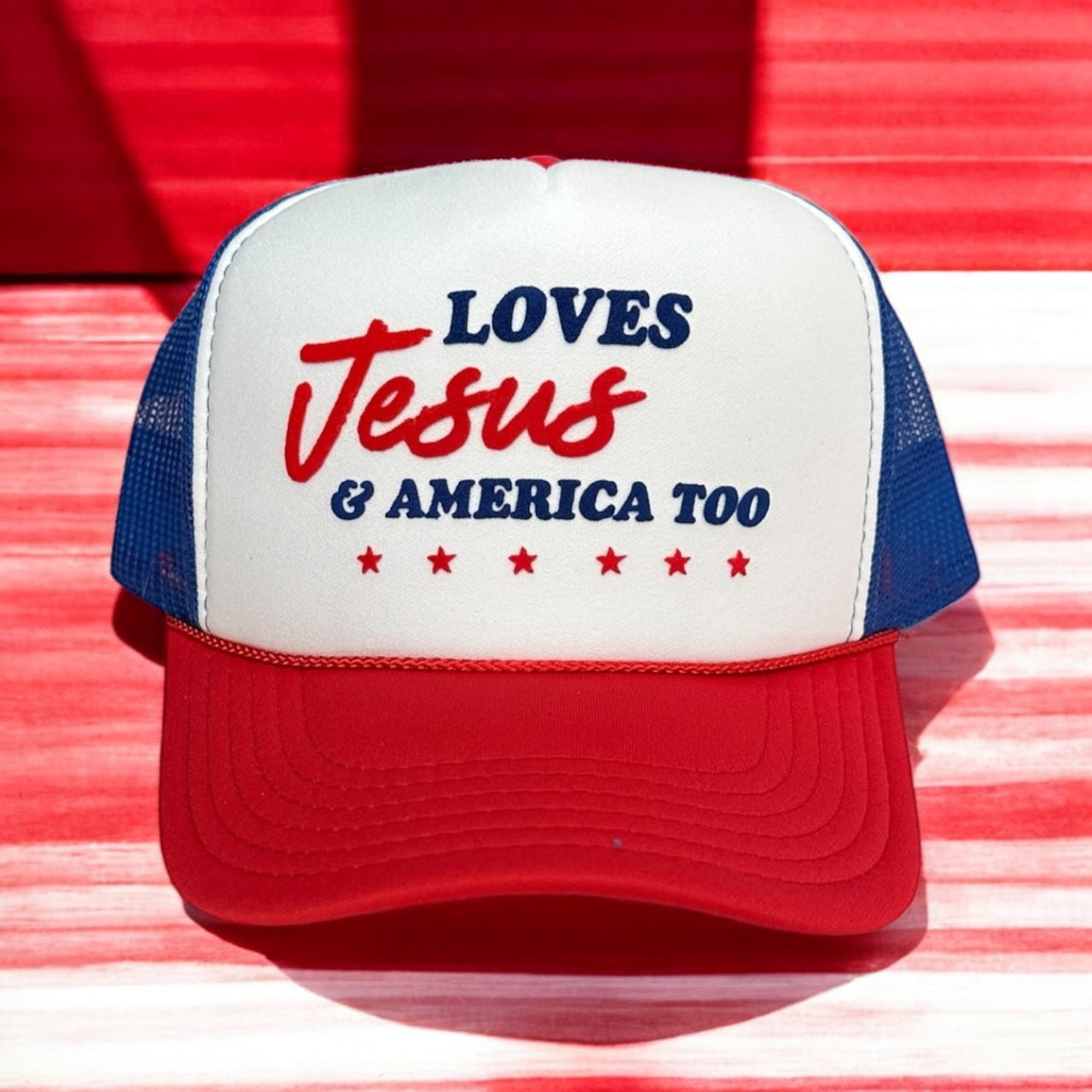 Loves Jesus & America too - Red, White & Blue Trucker Hat