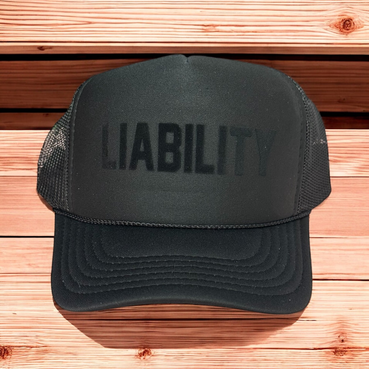 LIABILITY - Tonal Black Trucker Hat